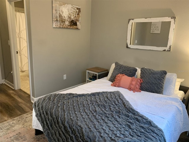 2048 Bristol Grande Way, Orlando, FL 32820 - bedroom featuring wood finished floors and baseboards