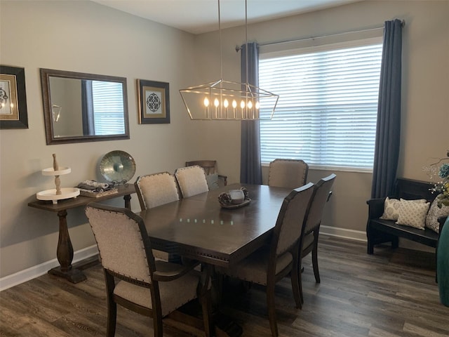 2048 Bristol Grande Way, Orlando, FL 32820 - dining space with dark wood-style floors, healthy amount of natural light, and a chandelier