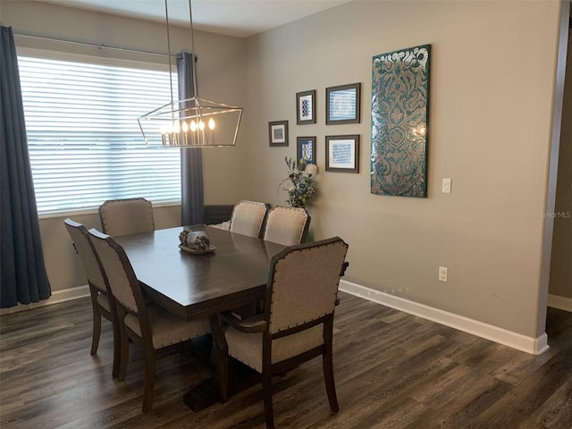2048 Bristol Grande Way, Orlando, FL 32820 - dining room with dark wood-type flooring, a chandelier, and plenty of natural light