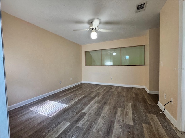 4224 SW 70th Ter Unit A, Gainesville, FL 32608 - spare room featuring wood finished floors, a ceiling fan, and a textured ceiling