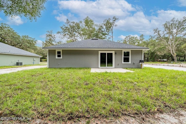 1262 Coral Farms Rd, Florahome, FL 32140 - rear view of property with a yard and stucco siding