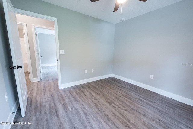 1262 Coral Farms Rd, Florahome, FL 32140 - unfurnished room featuring ceiling fan and wood finished floors