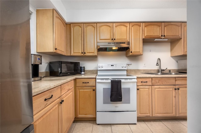 3434 NW 21st Dr Unit D4, Gainesville, FL 32605 - kitchen with under cabinet range hood, white electric range, freestanding refrigerator, black microwave, and light tile patterned floors