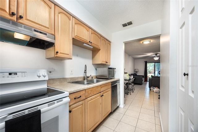 3434 NW 21st Dr Unit D4, Gainesville, FL 32605 - kitchen with white range with electric cooktop, under cabinet range hood, a textured ceiling, stainless steel dishwasher, and light tile patterned floors