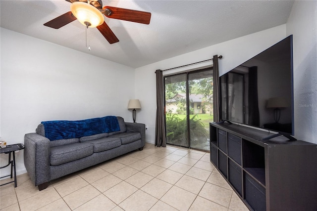 3434 NW 21st Dr Unit D4, Gainesville, FL 32605 - living area featuring a ceiling fan and light tile patterned flooring