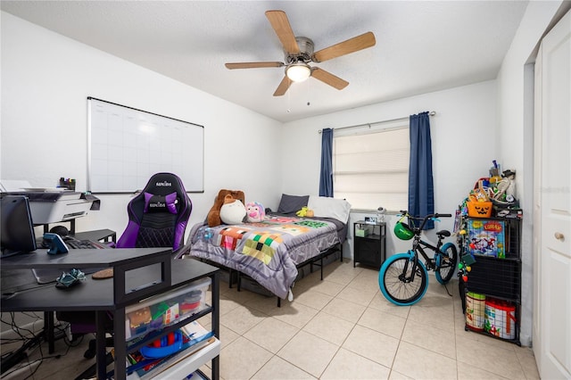 3434 NW 21st Dr Unit D4, Gainesville, FL 32605 - bedroom with light tile patterned floors, a desk, and ceiling fan