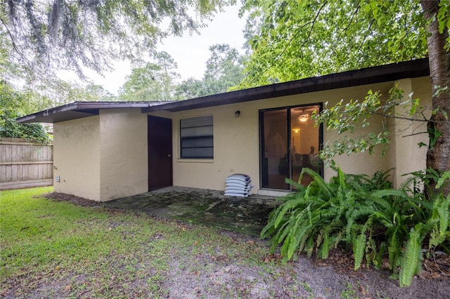 3434 NW 21st Dr Unit D4, Gainesville, FL 32605 - rear view of house with stucco siding