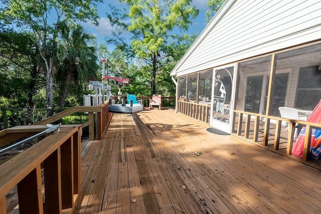 145 SE 904th Ave, Suwannee, FL 32692 - deck featuring a sunroom