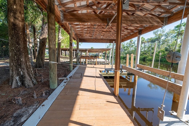 145 SE 904th Ave, Suwannee, FL 32692 - dock area with a water view and boat lift