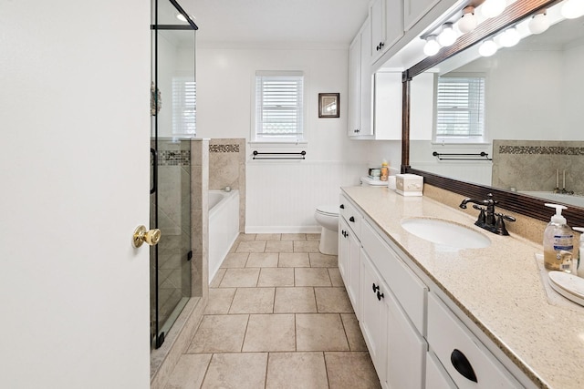 145 SE 904th Ave, Suwannee, FL 32692 - bathroom with plenty of natural light, vanity, tile patterned flooring, a garden tub, and crown molding