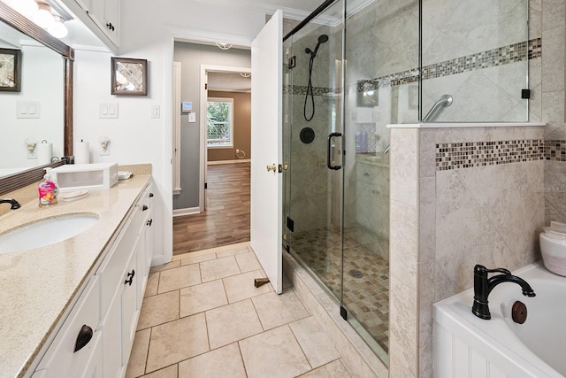 145 SE 904th Ave, Suwannee, FL 32692 - bathroom with double vanity, a stall shower, a bath, and tile patterned floors