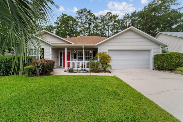 1602 NW 117th Ter, Gainesville, FL 32606 - ranch-style house featuring a porch, an attached garage, concrete driveway, a front lawn, and roof with shingles