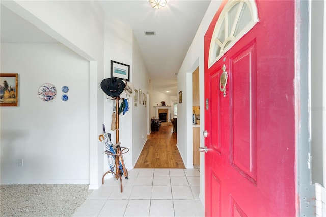 1602 NW 117th Ter, Gainesville, FL 32606 - foyer with light tile patterned floors and baseboards