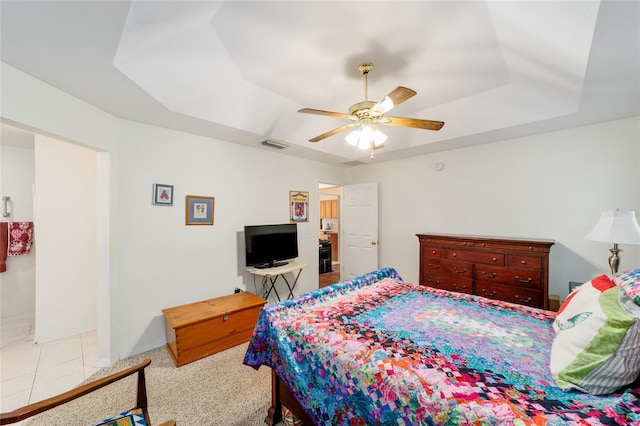 1602 NW 117th Ter, Gainesville, FL 32606 - bedroom featuring a tray ceiling and ceiling fan