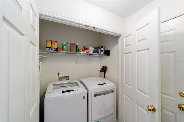 1602 NW 117th Ter, Gainesville, FL 32606 - laundry room with washing machine and clothes dryer