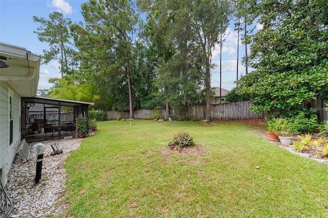 1602 NW 117th Ter, Gainesville, FL 32606 - fenced backyard featuring a sunroom