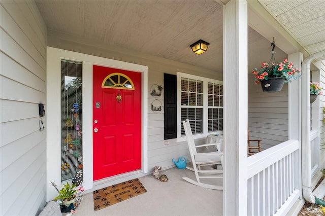 1602 NW 117th Ter, Gainesville, FL 32606 - doorway to property featuring a porch