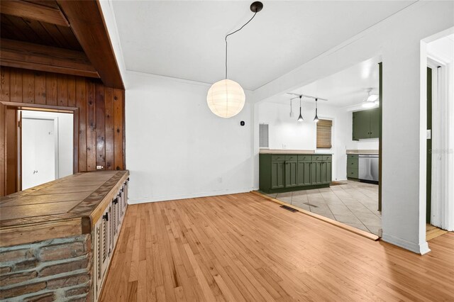 2225 NE 6th Ter, Gainesville, FL 32609 - unfurnished living room featuring light wood finished floors and ceiling fan
