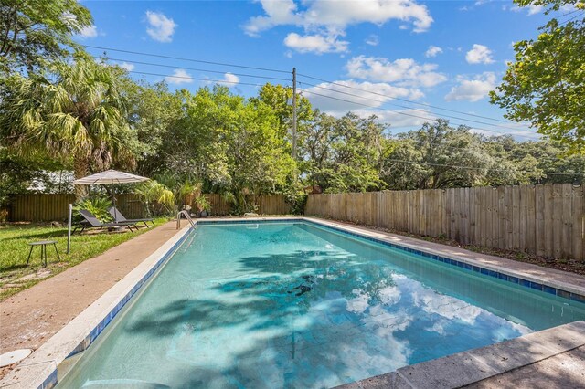 2225 NE 6th Ter, Gainesville, FL 32609 - view of swimming pool featuring a fenced backyard