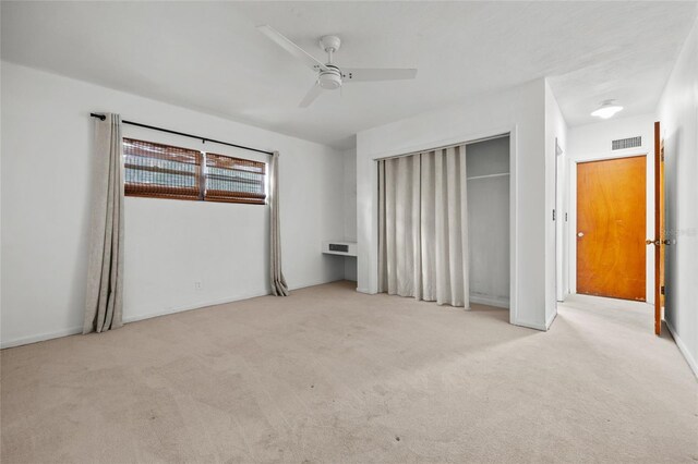 2225 NE 6th Ter, Gainesville, FL 32609 - unfurnished bedroom featuring carpet, ceiling fan, and a closet