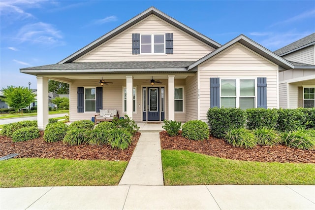 2782 SW 120th Dr, Gainesville, FL 32608 - bungalow-style home featuring ceiling fan, covered porch, and roof with shingles
