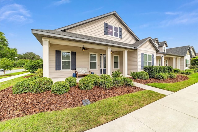 2782 SW 120th Dr, Gainesville, FL 32608 - view of front facade with ceiling fan and a porch