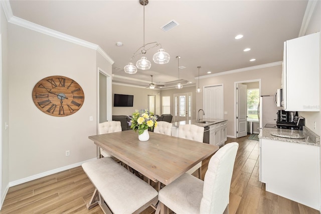 2782 SW 120th Dr, Gainesville, FL 32608 - dining area featuring a ceiling fan, ornamental molding, light wood-style floors, and recessed lighting