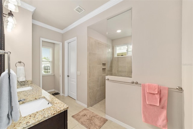 2782 SW 120th Dr, Gainesville, FL 32608 - full bath with plenty of natural light, a walk in shower, double vanity, crown molding, and tile patterned flooring