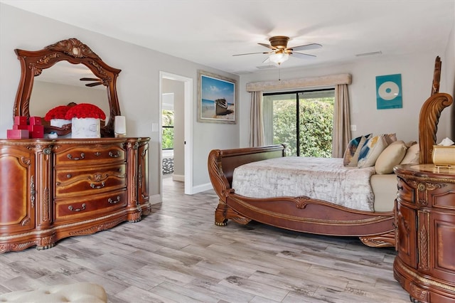 8321 SW 23rd Pl, Gainesville, FL 32607 - bedroom featuring light wood-type flooring and a ceiling fan