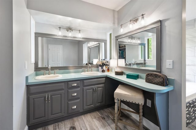 8321 SW 23rd Pl, Gainesville, FL 32607 - full bathroom with double vanity and wood finished floors