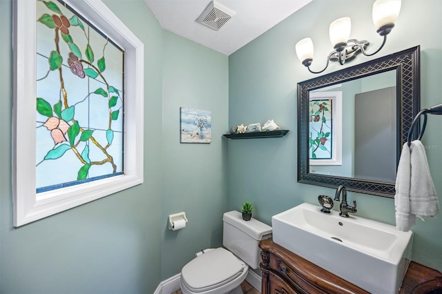 8321 SW 23rd Pl, Gainesville, FL 32607 - bathroom featuring toilet and vanity