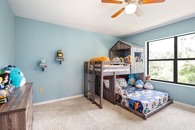 8321 SW 23rd Pl, Gainesville, FL 32607 - carpeted bedroom with multiple windows and ceiling fan