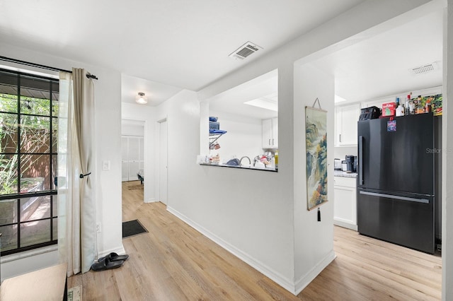 900 SW 62nd Blvd Unit I56, Gainesville, FL 32607 - corridor featuring light wood-type flooring and baseboards