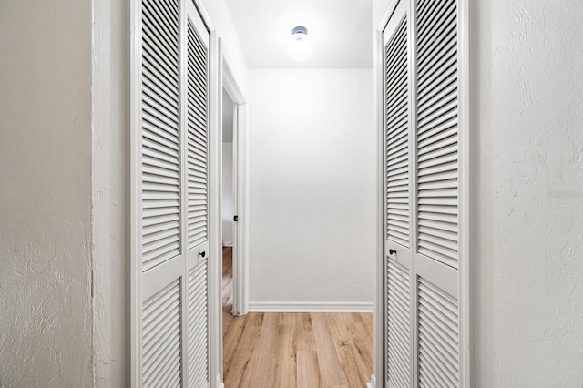 900 SW 62nd Blvd Unit I56, Gainesville, FL 32607 - corridor with a heating unit and light wood-type flooring