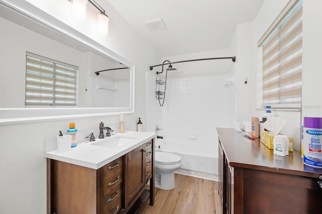 900 SW 62nd Blvd Unit I56, Gainesville, FL 32607 - full bathroom featuring vanity, bathtub / shower combination, and wood finished floors