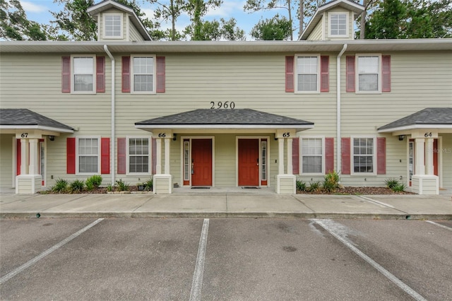 2960 SW 35th Pl Unit 66, Gainesville, FL 32608 - colonial-style house with uncovered parking