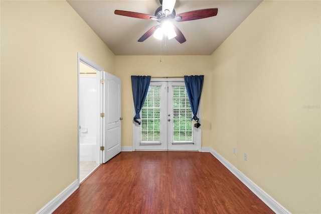 2960 SW 35th Pl Unit 66, Gainesville, FL 32608 - empty room featuring wood finished floors, a ceiling fan, and french doors