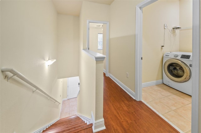 2960 SW 35th Pl Unit 66, Gainesville, FL 32608 - laundry room featuring washer / dryer and wood finished floors