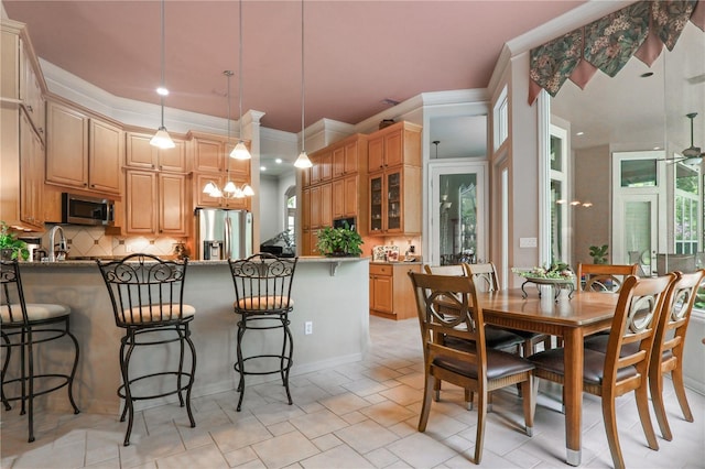 5025 NW 51st Pl, Gainesville, FL 32606 - dining area featuring light tile patterned floors