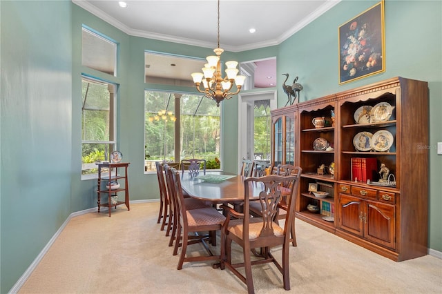 5025 NW 51st Pl, Gainesville, FL 32606 - dining room with light carpet, a chandelier, ornamental molding, and recessed lighting