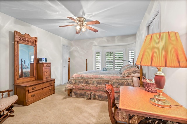 5025 NW 51st Pl, Gainesville, FL 32606 - bedroom with carpet and a ceiling fan