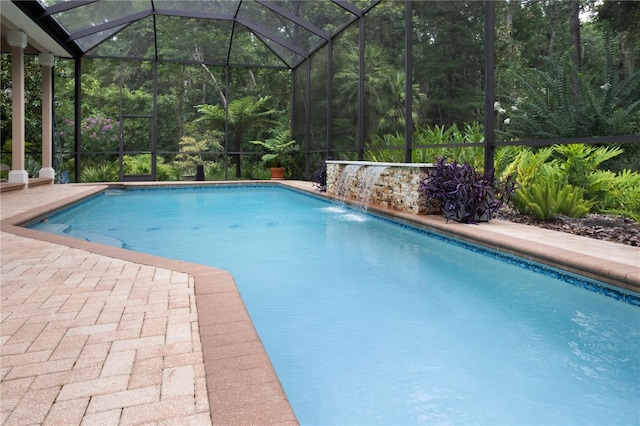 5025 NW 51st Pl, Gainesville, FL 32606 - outdoor pool with a lanai and a patio
