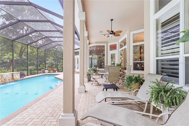 5025 NW 51st Pl, Gainesville, FL 32606 - outdoor pool with a patio, ceiling fan, and glass enclosure