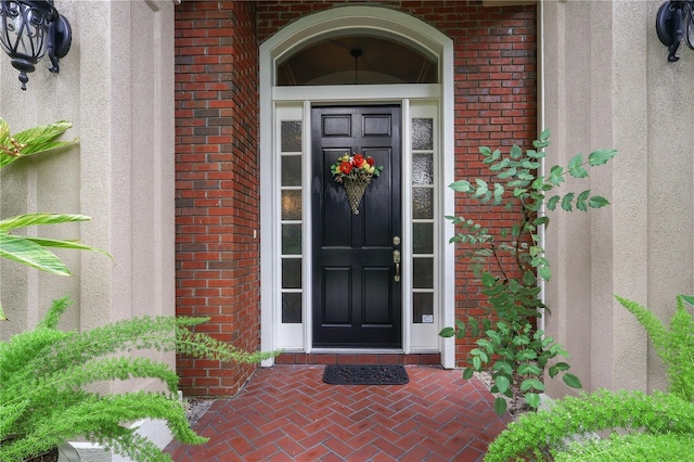 5025 NW 51st Pl, Gainesville, FL 32606 - doorway to property featuring brick siding