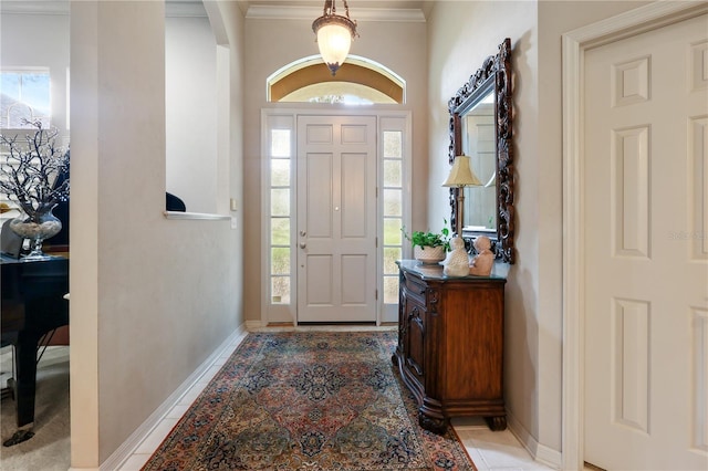 5025 NW 51st Pl, Gainesville, FL 32606 - foyer featuring ornamental molding, arched walkways, and healthy amount of natural light