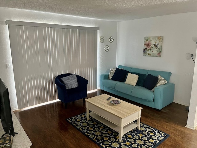 3705 SW 27th St Unit 1112, Gainesville, FL 32608 - living room featuring wood finished floors and baseboards