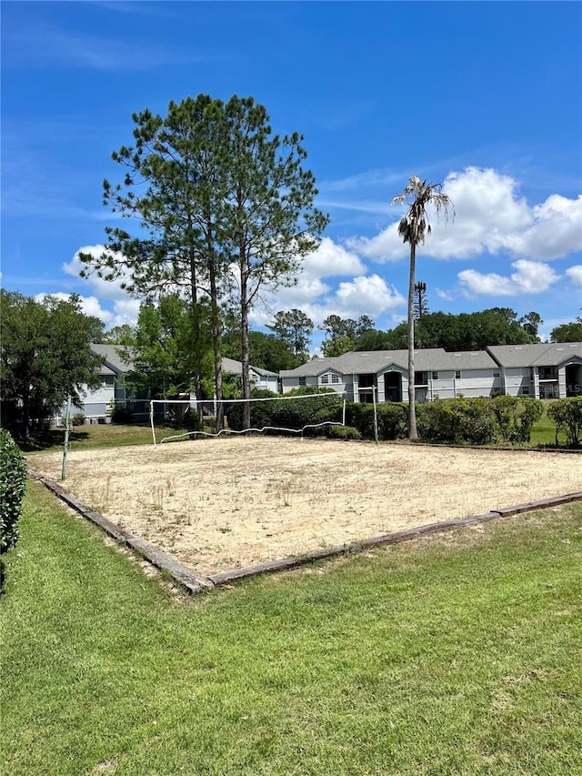 3705 SW 27th St Unit 1112, Gainesville, FL 32608 - surrounding community featuring volleyball court, a yard, and dirt driveway