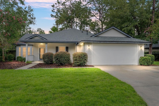 8036 SW 72nd Pl, Gainesville, FL 32608 - ranch-style home with driveway, an attached garage, a front lawn, and roof with shingles