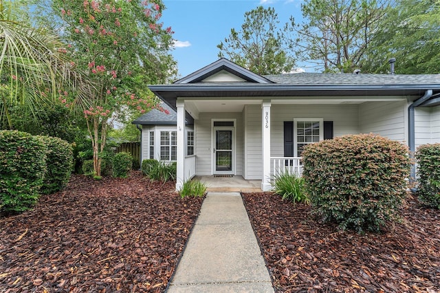 8036 SW 72nd Pl, Gainesville, FL 32608 - view of front of property featuring covered porch and roof with shingles