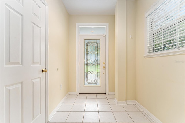 8036 SW 72nd Pl, Gainesville, FL 32608 - entrance foyer with light tile patterned floors and baseboards